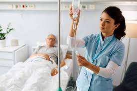 Photo of a nurse using an automated label printer to increase nurse productivity